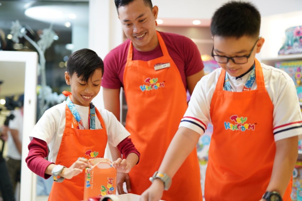 Parents play with kids at KidZania 